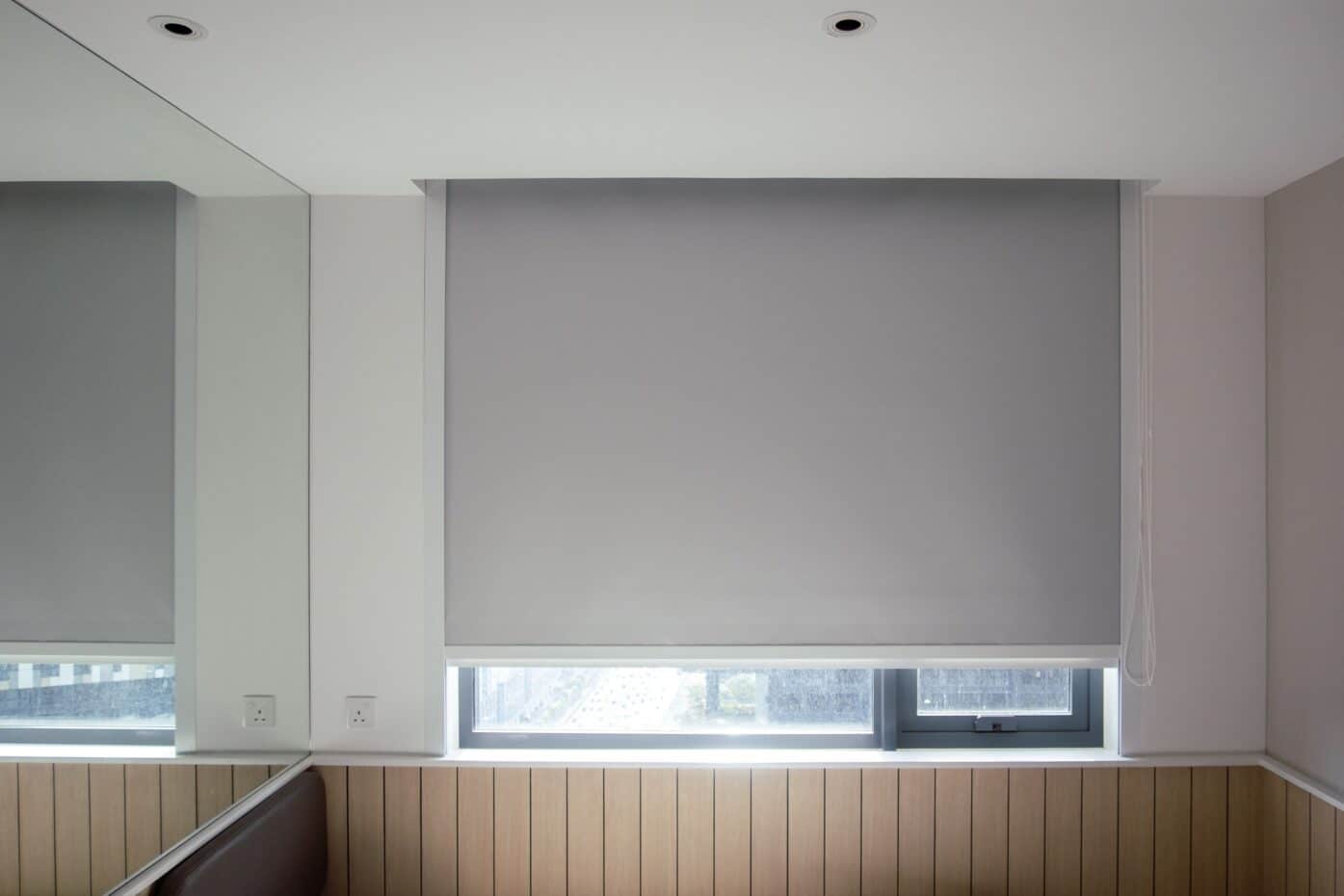 Blackout blinds mostly closed.