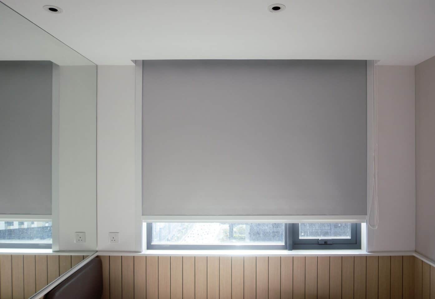 Blackout blinds mostly closed.